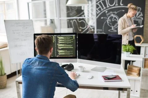 Program Developer in Modern Office Stock Photos