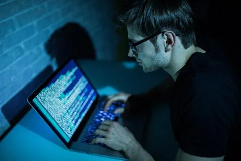 Program development concept young man working with computer Foto stock