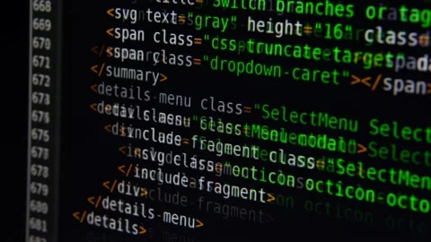 The program text moves on the computer screen. Macro shooting of computer Stock Footage 139594556