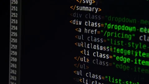 The program text moves on the computer screen. Macro shooting of computer Stock Footage 139594706