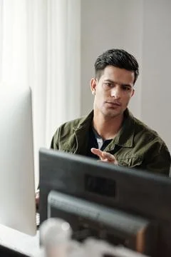 Programer Checking Code for Mistakes Stock Photos