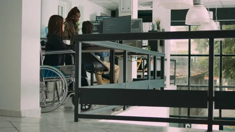 Programer with chronic disability typing source code on computer Stock Footage 227616864