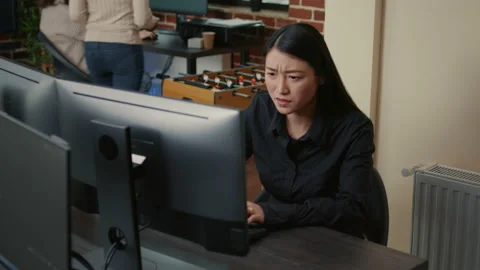 Programer focused on writing code encounters system failure while parsing Stock Footage 168233604