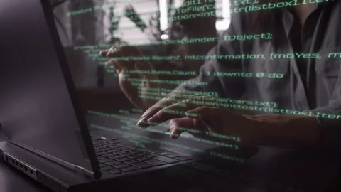 Programer hands busy working with augmented reality holograms of code Stock Footage 206761618