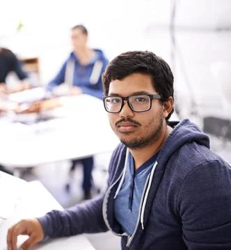 Programer, spectacles and portrait in office for information technology Stock Photos