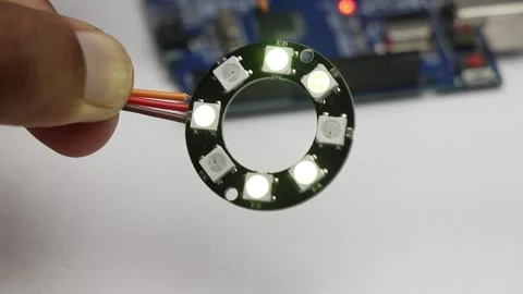 Programmable ARGB LED ring light glowing with color patterns Video stock 336626563