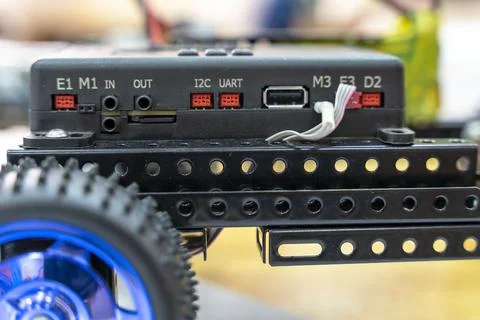 Programmable children's robot car in the form of a platform on wheels Foto stock