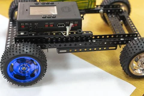 Programmable children's robot car in the form of a platform on wheels Foto stock