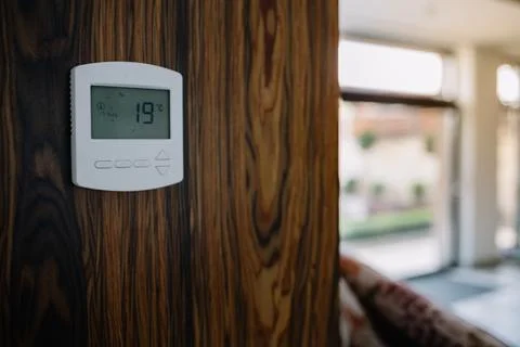 Programmable thermostat for temperature control in home Stock Photos