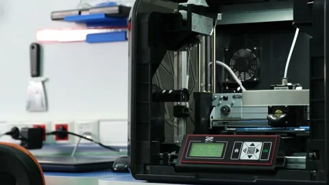 A programmed 3D printer makes a plastic part 動画素材 171290887