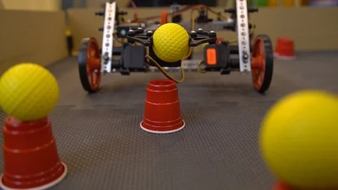 A programmed robot made of a designer performs a task on a special site.The Video stock 119544244