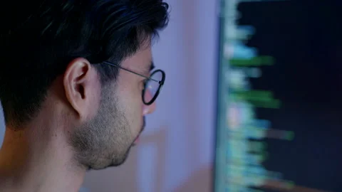 Programmer Analyzing Data on Computer Screen. Stock Footage 273192644