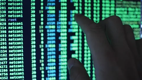 Programmer analyzing html green code on the computer's monitor Stock Footage 201145894