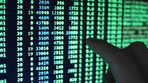 Programmer analyzing html green code on the computer's monitor Stock Footage 201145895