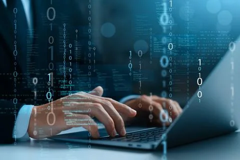 Programmer and cyber security technology, male programmer uses laptop for s.. Stock Photos