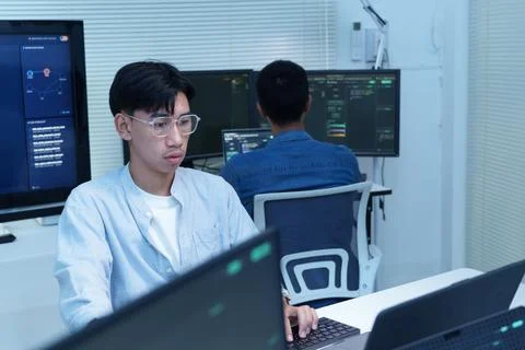 Programmer and Developer Working on Digital Code 库存照片