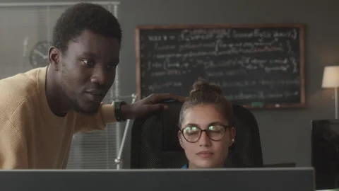 Programmer and IT Project Manager Having Talk in Office Video stock 263733258