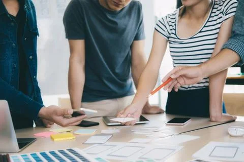 Programmer and Web designer, UX UI meeting for planing mobile application. Stock Photos