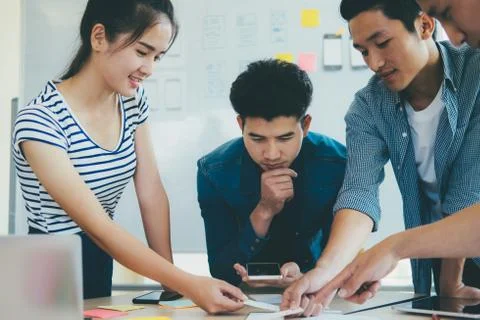 Programmer and Web designer, UX UI meeting for planing mobile application. Stock Photos