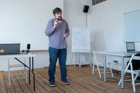 Programmer, architect sharing his experience. Political technologist giving Stock-Fotos