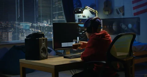 Programmer boy coding on his computer Stock Footage 105346904