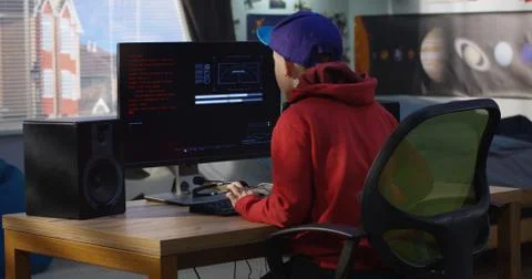 Programmer boy coding on his computer 스톡 사진