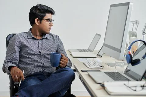 Programmer busy with his work Stock Photos