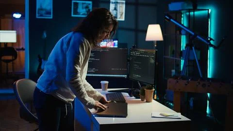 Programmer closing backpack, leaving home office, finishing job shift Stock Photos