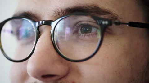 Programmer, code reflection in glasses and cyber security for update server Stock-Footage 224643088