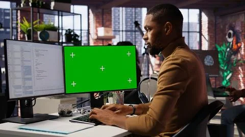 Programmer coding in AI startup office using isolated screen PC Stock Photos