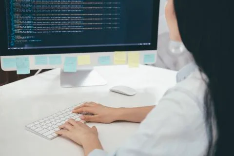 Programmer is coding and programming software 库存照片