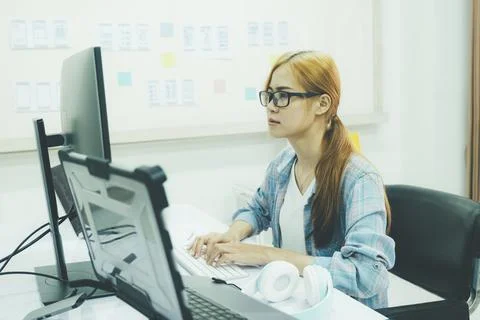 Programmer is coding and programming software. 库存照片