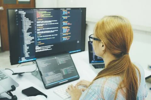 Programmer is coding and programming software. Stock-Fotos