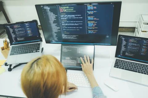 Programmer is coding and programming software. Stock-Fotos