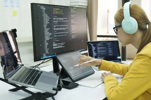 Programmer is coding and programming software. 스톡 사진