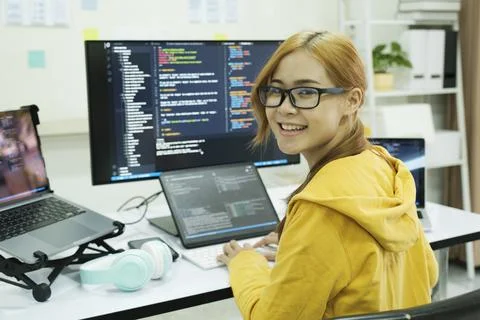 Programmer is coding and programming software. Stock Photos