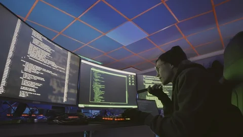 Programmer Coding and Recording Voice Message Stock Footage 129813178