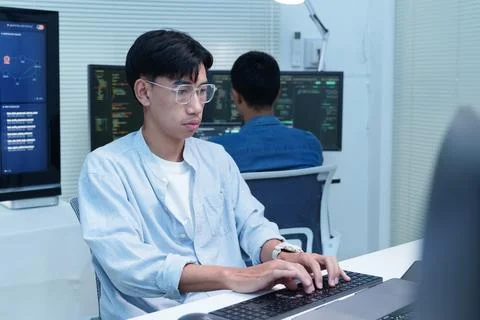Programmer Coding on Computer for Digital Technology Development Foto stock
