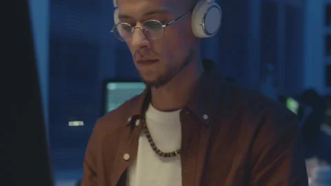 Programmer Coding on Computer at Night Stock Footage 259160559