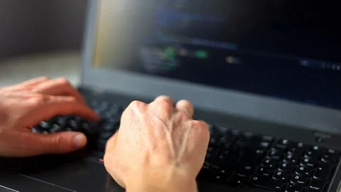 Programmer coding on laptop computer. Coder hand closeup writing program code Stock Footage 118614331