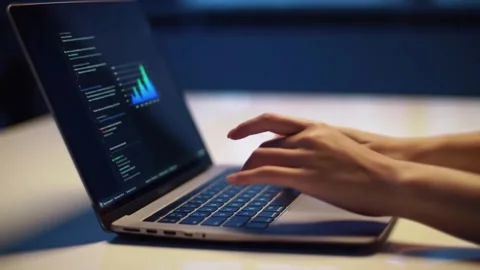 Programmer Coding on a Laptop, Screen Reflection Stock Footage 313439086