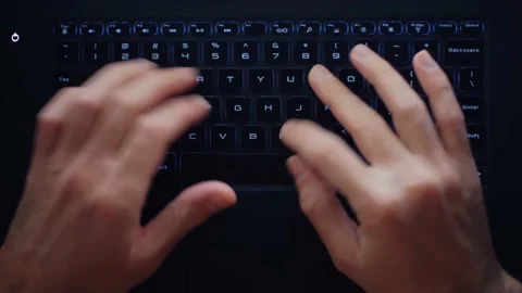 Programmer coding on modern laptop computer at night. IT specialist working Stock Footage 172190398