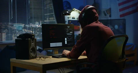 Programmer coding at night Stock Footage 105346859