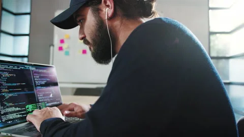 Programmer coding in an office Stock Footage 221997607