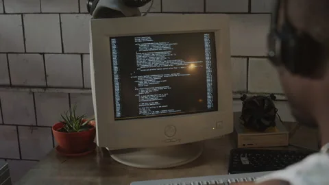 Programmer Coding on Old Computer in Post Apocalypse Bunker Stock Footage 266407508