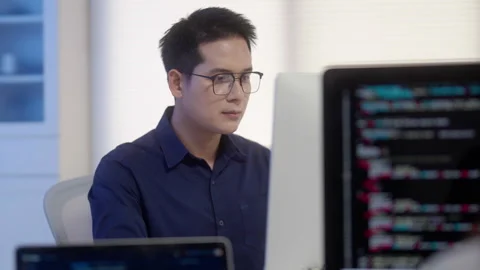 Programmer Coding Software on Computer in Modern Office Video stock 343625293
