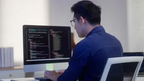 Programmer Coding Software on Desktop Computer Video stock 343622878