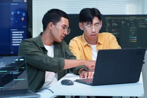 Programmer Collaboration on Software Development Project Stock Photos