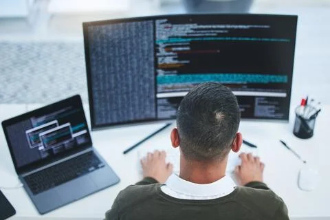 Programmer, computer and developer man for coding, software script or cyber Stock Photos
