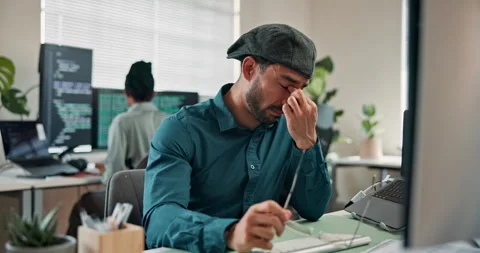 Programmer, computer and headache in office with eye strain, tired or frustrated Stock Footage 346949248